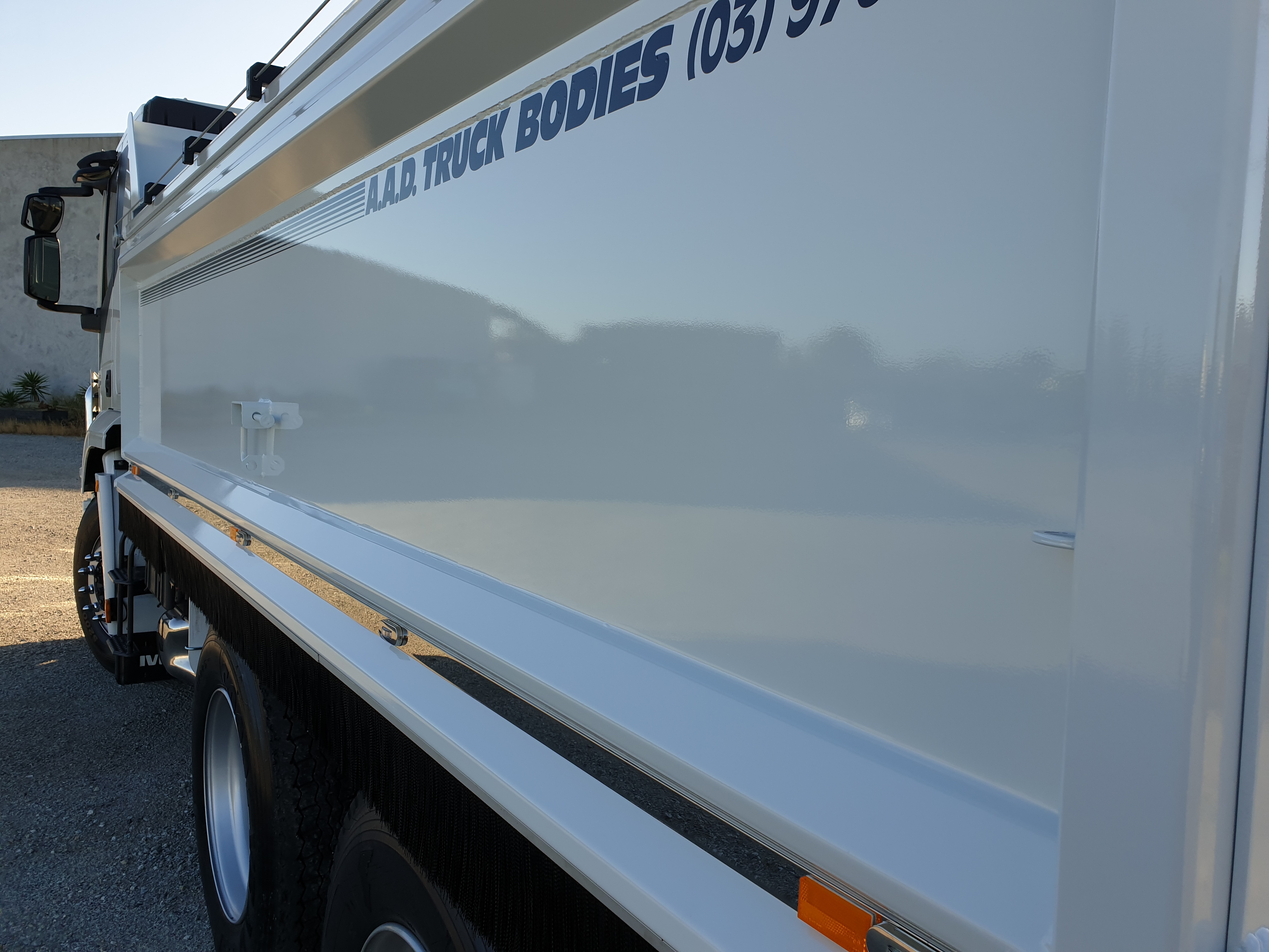 Truck body side panel on a tipper truck